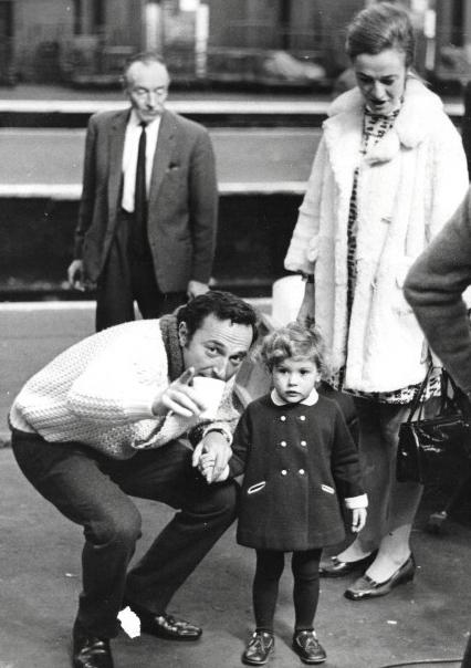 Alvin on set with his wife and little girl